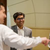 Prithwi (right) learning from a poster